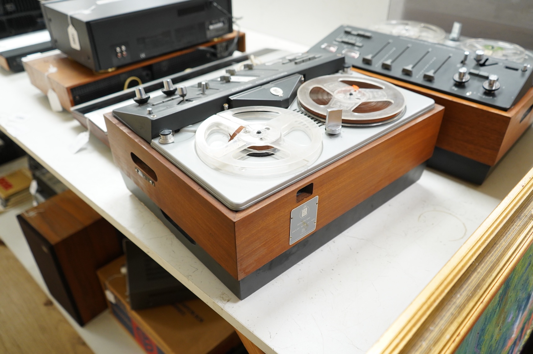 Two Bang & Olufsen Beocord 2000 reel to reel tape recorders, one missing lid